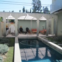 covered patio off of pool