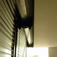 detail of recessed roll-up doors