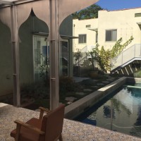 view of pool from covered patio