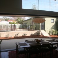 exterior pocket sliding door connecting inside to outside - photo by Lisa Palmer, Hyperion Art