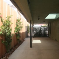 carport with electric charging stations - photo by Lisa Palmer, Hyperion Art