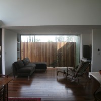 media room alcove off of two story living room - photo by Lisa Palmer, Hyperion Art