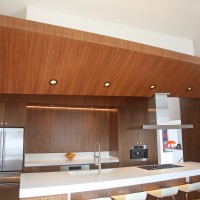 wood 'wing' above kitchen island