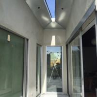 bifurcated studio with existing on right and new on left